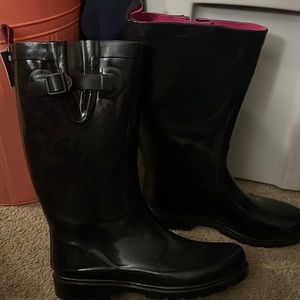 Woman’s black rain boots